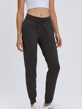 Load image into Gallery viewer, BUCK Double Take Tied Joggers with Pockets
